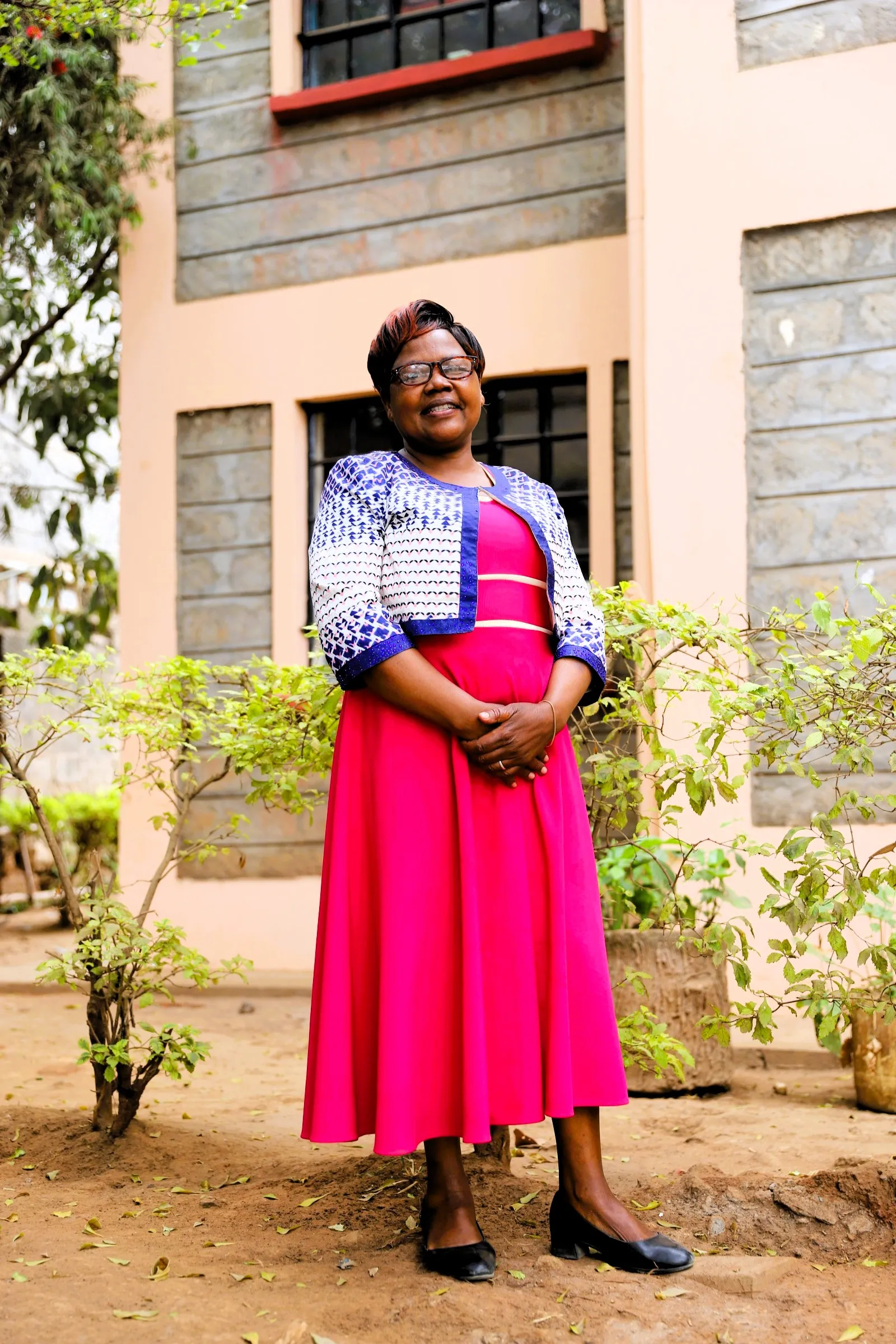 Teacher Lucy interacting with members of the home